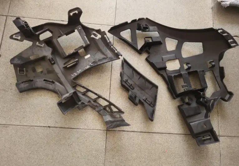 Base frame left and right bumpers